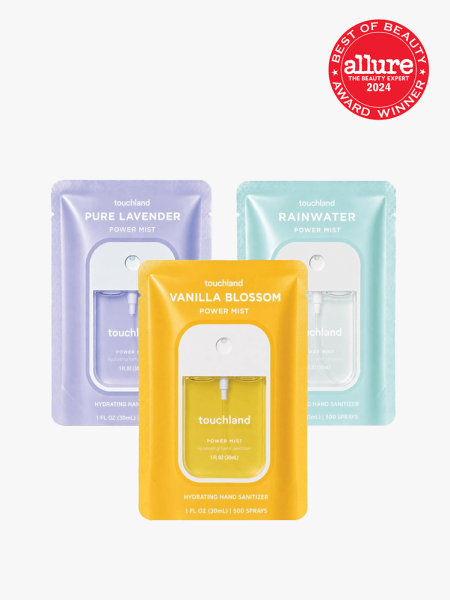 Touchland Blossom Trio Power Mists in branded components with best of beauty 2024 seal in the top right corner on a light gray background