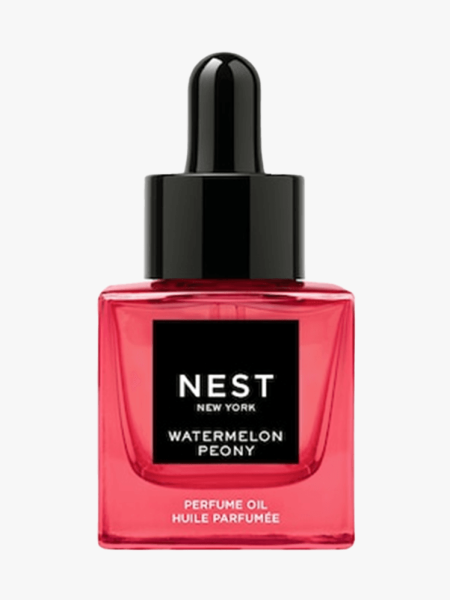 Pink bottle of Nest New York Watermelon Peony Perfume Oil with black cap 
